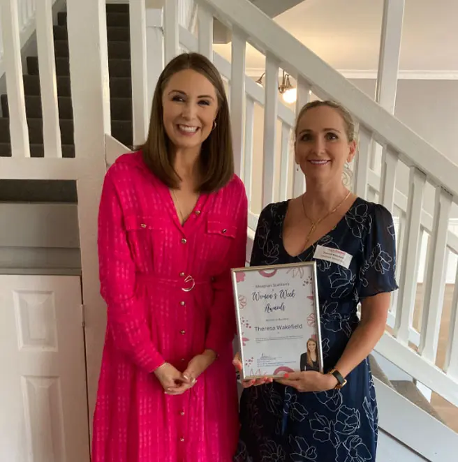 Sensei Olivia (Leadership Program), Miss Theresa, and Sensei Angel receiving awards for their volunteer work supporting women and children.